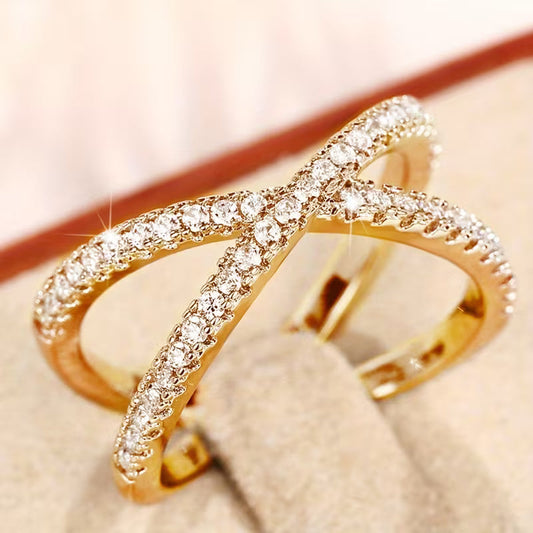 Anillo Cruz de zirconia entrelazada