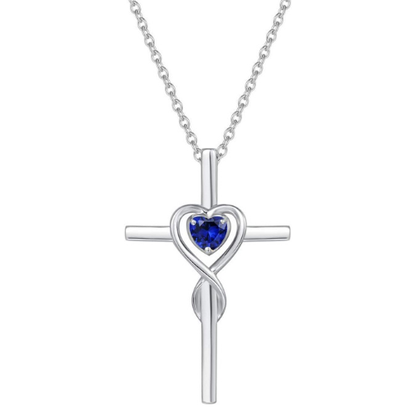 Collar de cruz de piedra corazón de zafiro | Oro Blanco