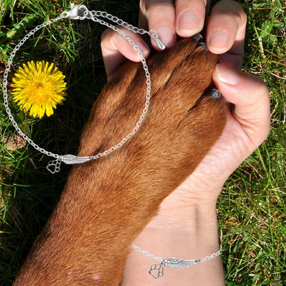 Pulsera Conmemorativa de Plata con Ala de Ángel y Huella de Pata |